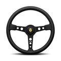 Racing Heritage gloss red horn button  progressive numbering  part number-V1968RHE35BKR  parallel white stitching  MOMO Racing Heritage Steering Wheels  MOMO hub kits  MOMO Heritage stacked logo  limited edition  laser mark on the back of the spoke  laser engraved aluminum plate  gloss red horn button  Ferrari and Porsche designs  extra-smooth black leather  dish 0mm horn  black leather