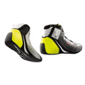 Sizes: 37-48  Rear bellow to increase comfort  Perforated leather for breathability  Part number: IC0-0805-B01  OMP EVO X-R Racing Shoes  Navy blue/silver/cyan  Miki-Motorsports  Micro adjustment ROTOR LACING  Lightweight and comfortable structure  Increased sensitivity on the pedal  High resistance and best grip  Fluo yellow  FIA 8856-2018 Approved  Colors: Black  Black/silver/red  Black/silver/fluo yellow