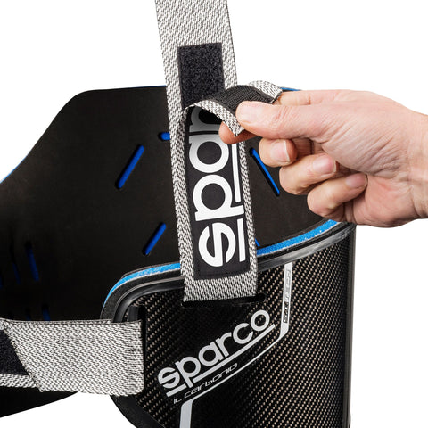 The IL Carbonio  The Sparco K-Track  shell  fibre  Two inner layers of foam material with shock  padding without adding bulk  Adjustable with Velcro shoulder straps and central chest strap closure  ultra  protectors  2023 Sparco IL Carbonio  Rib Protector